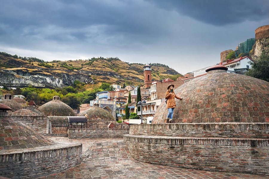 Traveler in abanotubani district tbilisi, Georgia with EVANI Travel